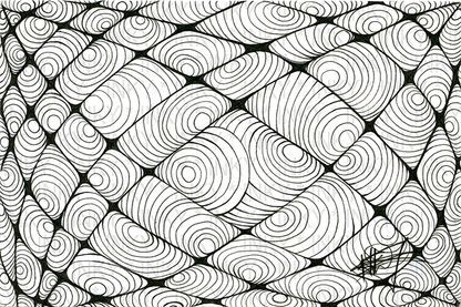 Black and white pattern of concentric circles on a textured background